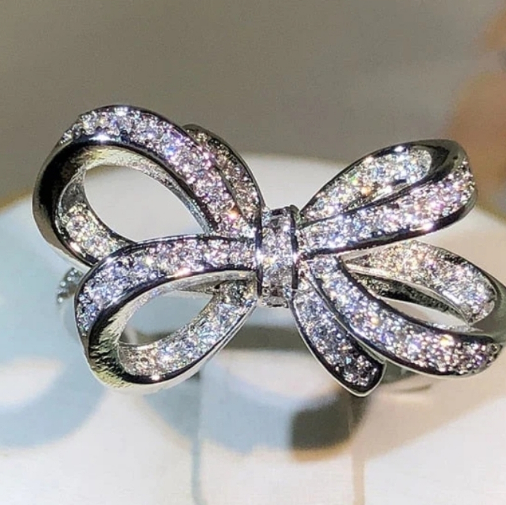 STERLING SILVER BRILLIANT BOW RING, Size 8